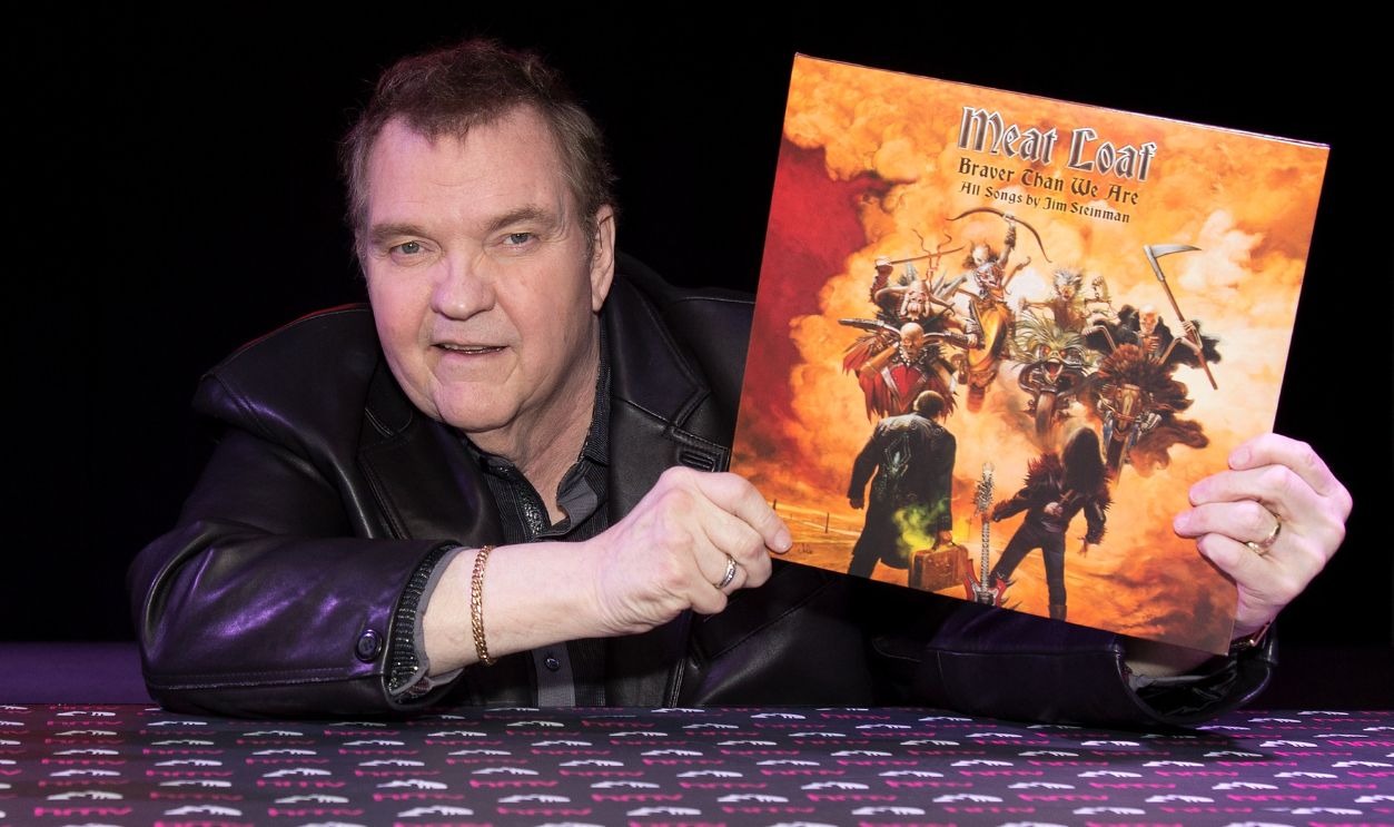 LONDON, ENGLAND - SEPTEMBER 08: Meat Loaf, Bat Out of Hell singer meets fans and signs CD booklet ahead of the release of his new album 'Better Than We Are' at HMV Oxford Street on September 8, 2016 in London, England.