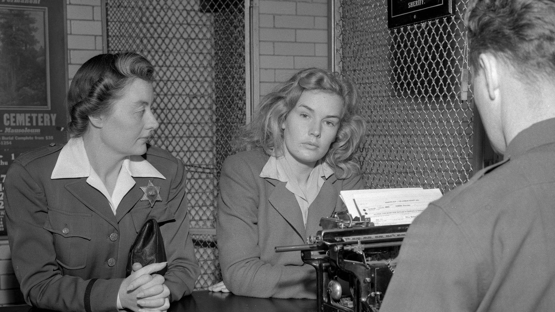 File:Frances Farmer being booked by sheriff.jpg