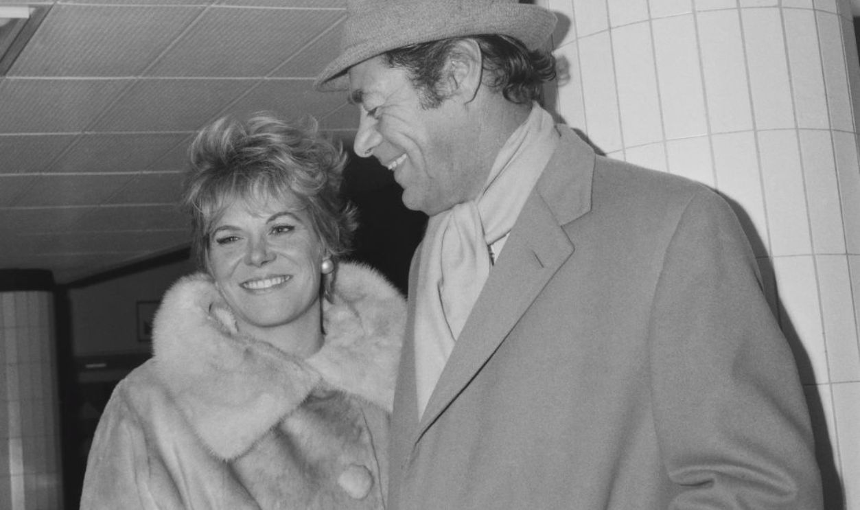 Welsh actress Rachel Roberts (1927 - 1980) smiles with her husband, English actor Rex Harrison (1908 - 1990), UK, 3rd April 1964. 