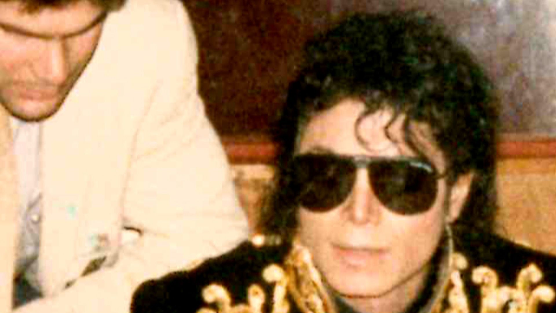 File:Michael Jackson autographing 'We Are The World' posters 1985.jpg