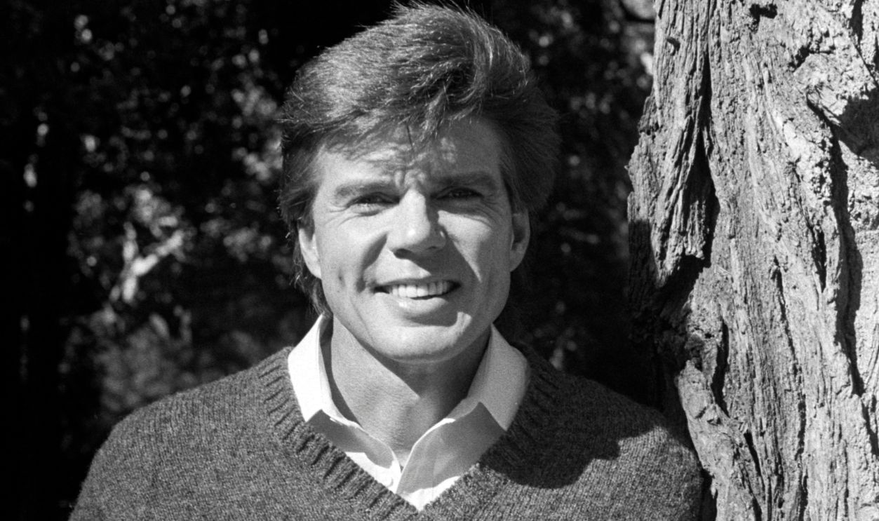 Actor John Davidson answers questions during an interview.