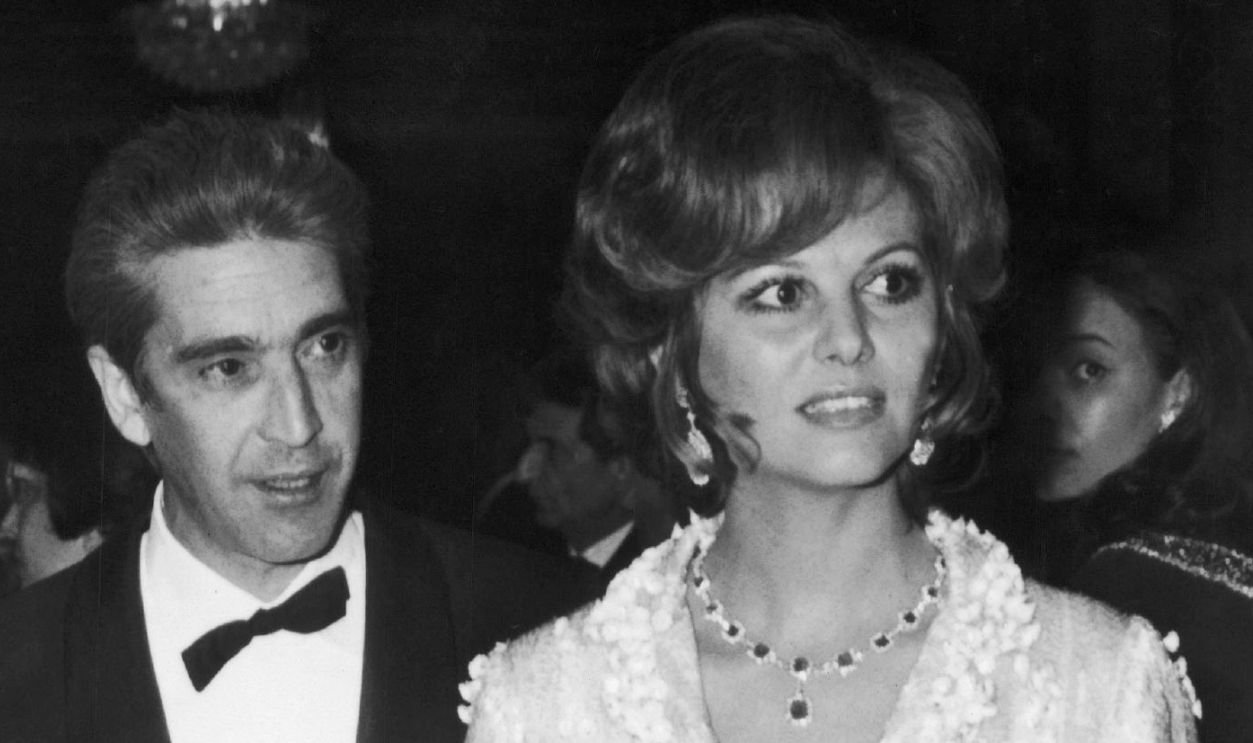 ITALY - MARCH 14: On March 14, 1970, The Actress Claudia Cardinale Arrived At The Rome Opera With Her Husband Franco Cristaldi For The Premiere Of The Film Les Fleurs Du Soleil, Starring Her Compatriot Sophia Loren.