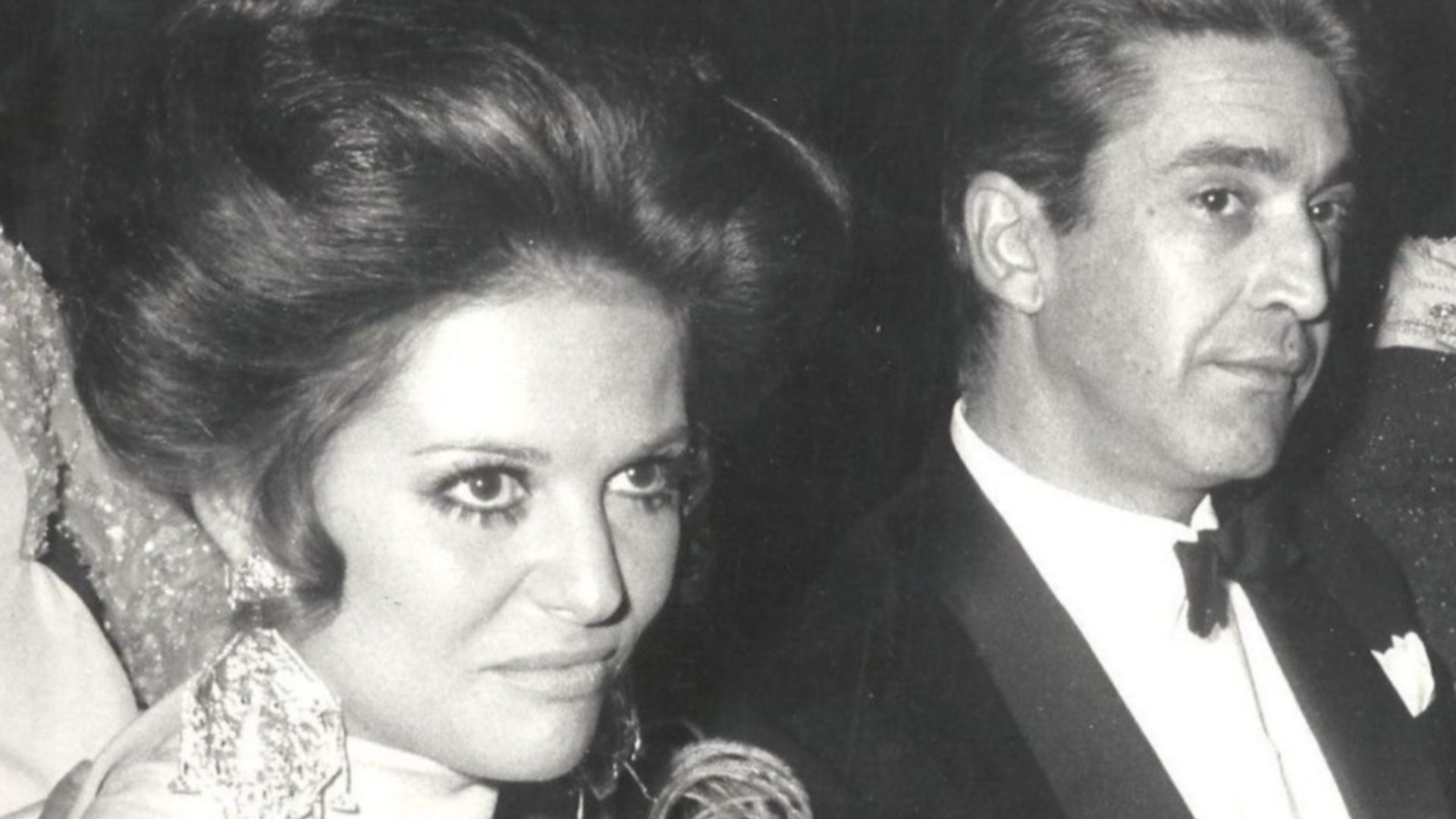 Claudio Cardinale and Franco Cristaldo.  He was a film producer born in 1924, and her mentor since the late 1950s. She was born in 1938. They were living together (maybe married) 1966 to 1975. So this may be around 1965. Just a guess.