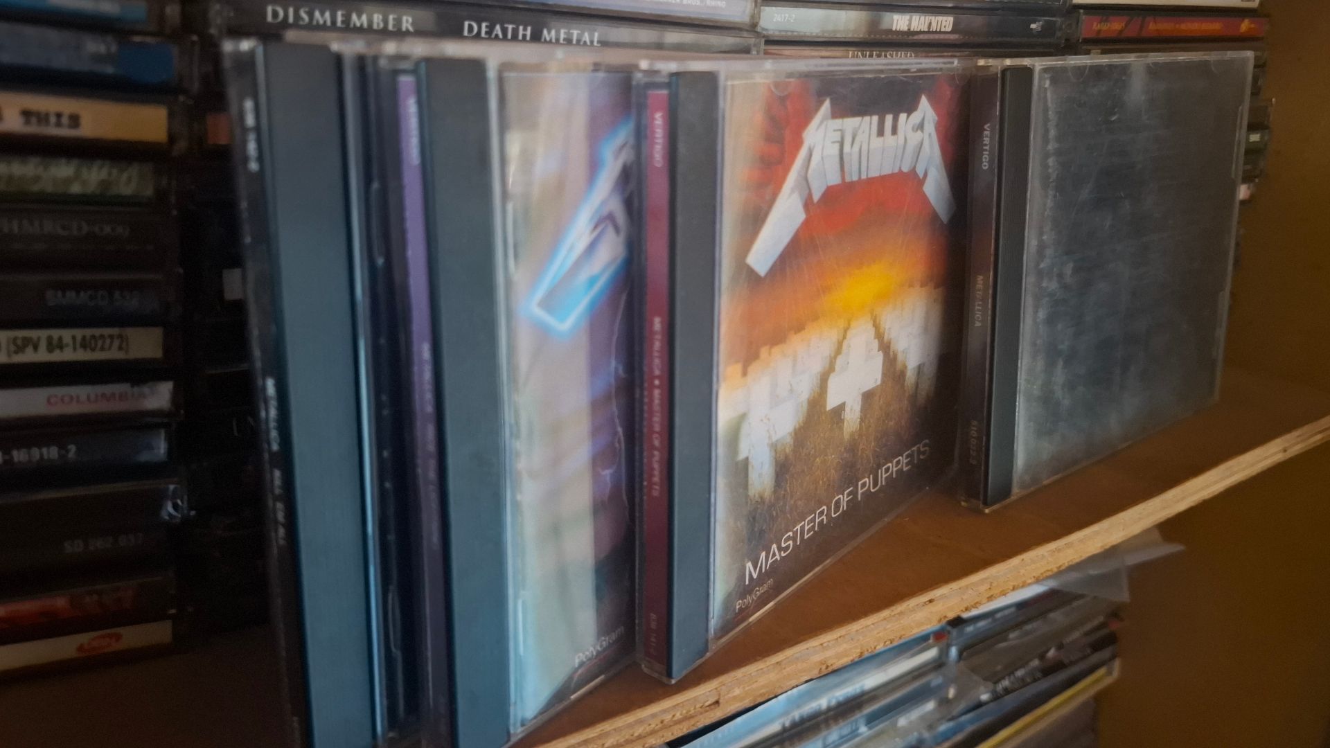 Some Metallica CDs (Kill 'Em All, Ride the Lightning, Master of Puppets, Metallica or Black Album)