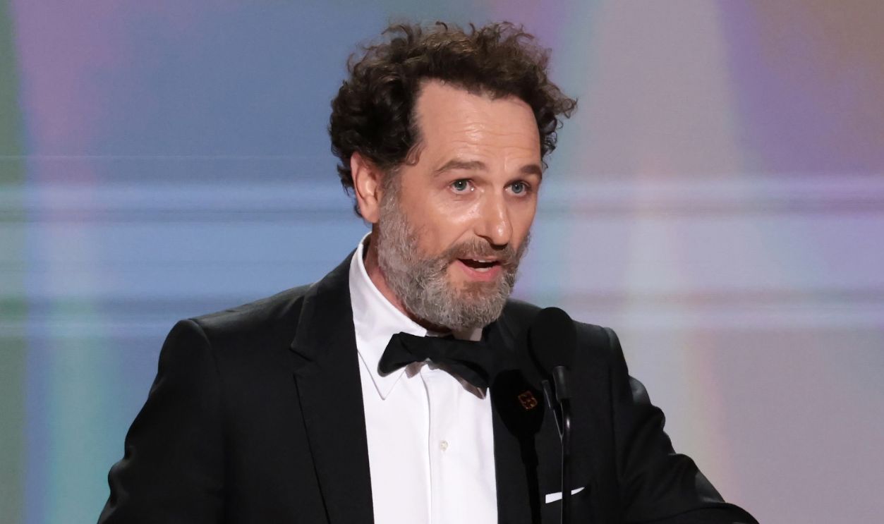 Getty Images - 2294860641 - Matthew Rhys accepts the Emmy for Outstanding Lead Actor in a Comedy Series for "Widow's Bay" during the 78th Emmy Awards ceremony at the Peacock Theater in Los Angeles, CA.
