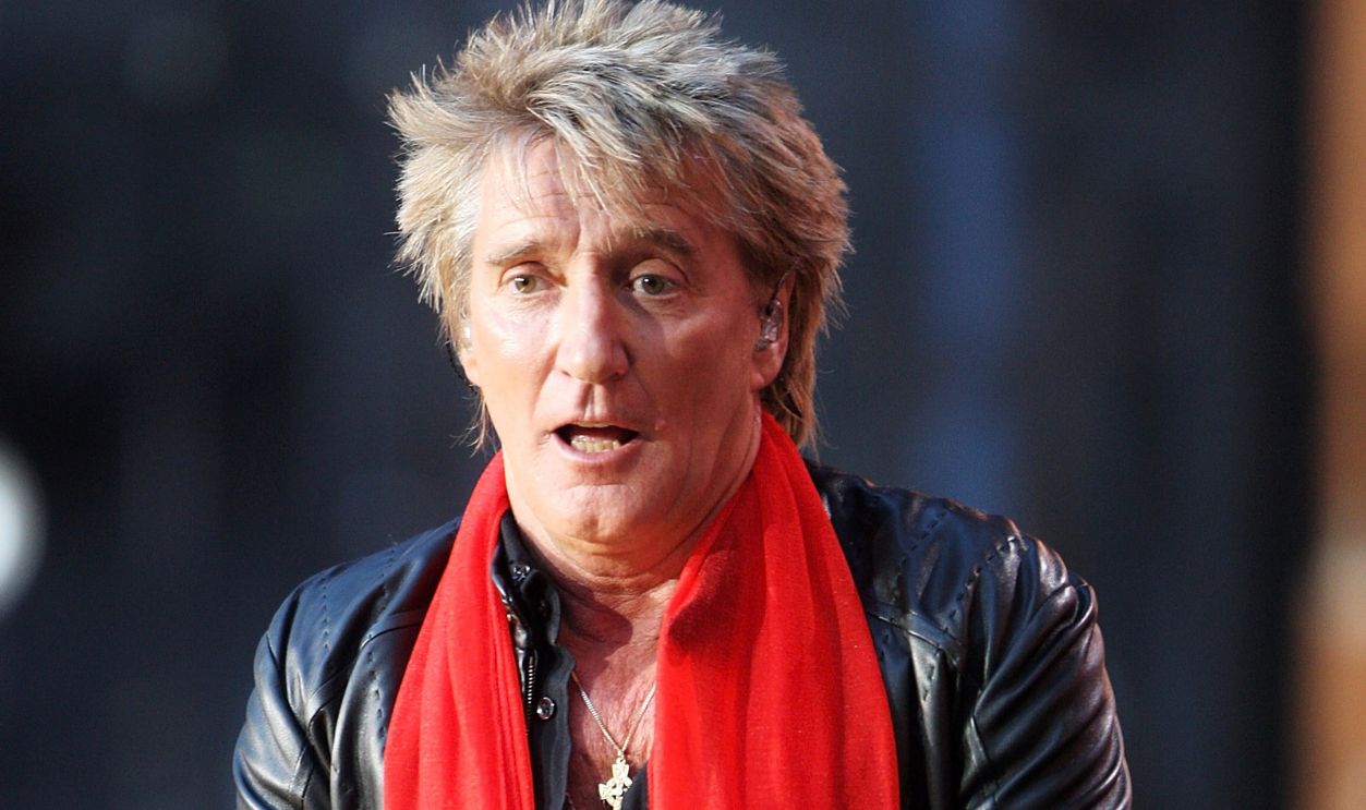 Rod Stewart kicks a football on stage at the Concert for Diana at Wembley Stadium on July 1, 2007 in London, England. The Concert falls on the date that would have been the late Princess's 46th birthday and marks 10 years since her death with an event headed by Princes William and Harry to celebrate her life.