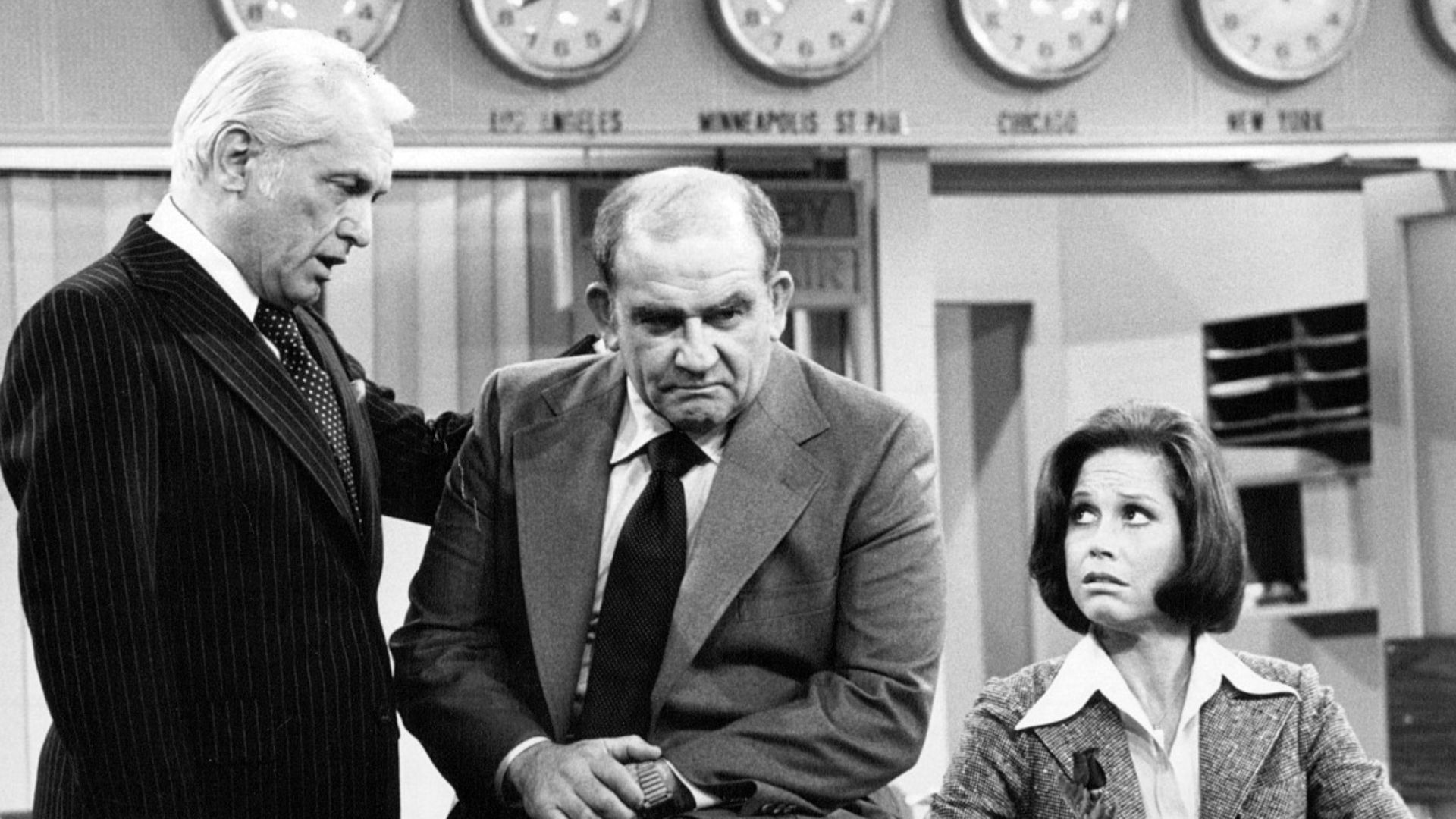 Photo of Ted Knight as Ted Baxter, Ed Asner as Lou Grant and Mary Tyler Moore as Mary Richards from the last episode of The Mary Tyler Moore Show-