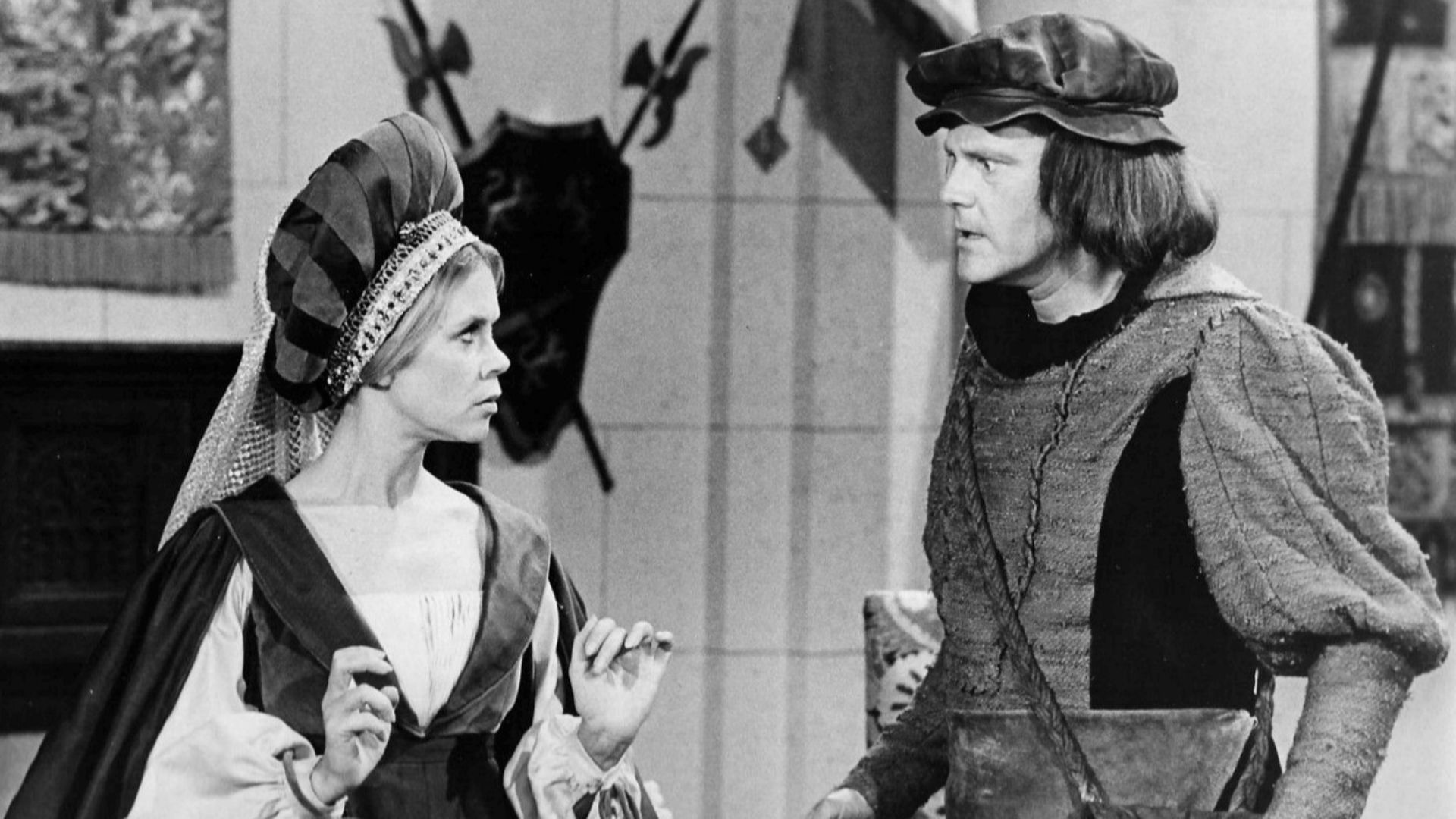 Photo of Elizabeth Montgomery and Dick Sargent from the television program Bewitched.  In this episode, Samantha gets sent back in time to the era of Henry VIII, where she is a minstrel in a traveling show, and also in danger of becoming one of Henry's wi