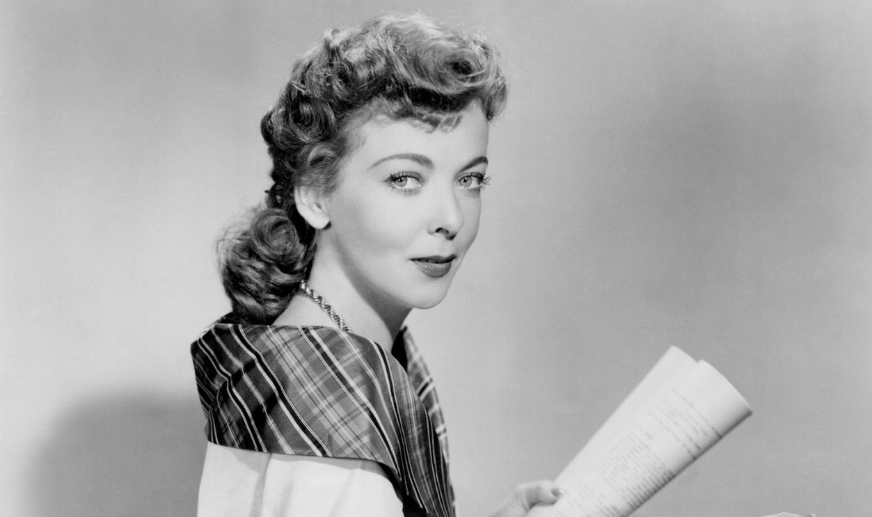 Publicity portrait of British actor Ida Lupino (1918-1995) holding a script on the set of the film 'Women's Prison', 1955, United States