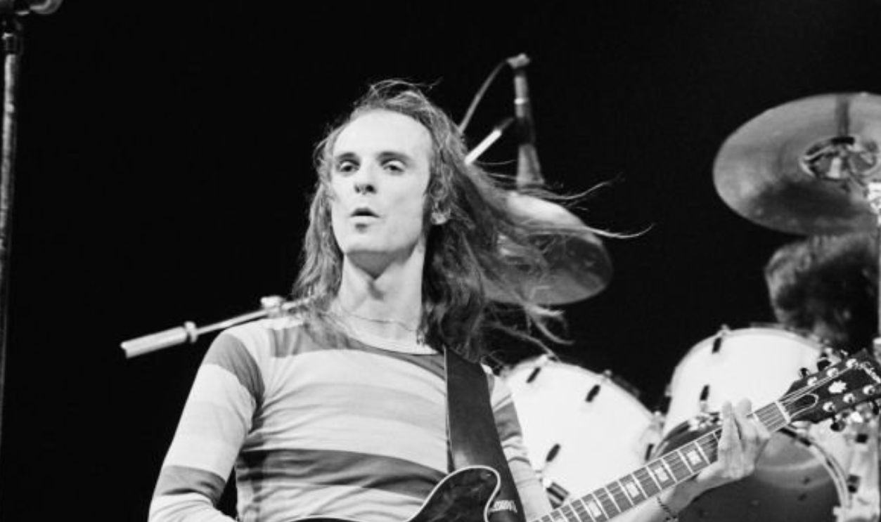 COVENTRY, ENGLAND - 9th MAY: Kim Mitchell, singer and guitarist with Canadian rock band Max Webster, playing the guitar during a live concert performance by the band at the Coventry Theatre in Coventry on 9th May 1979.