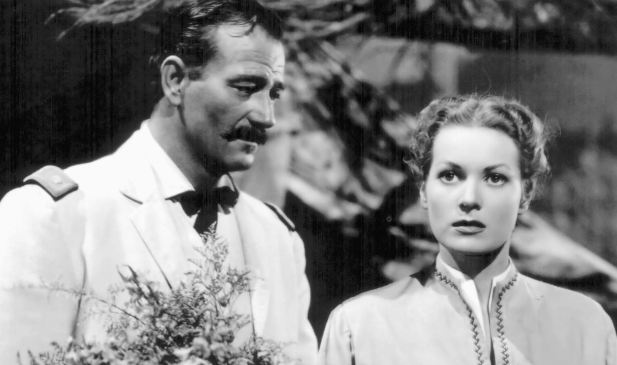 American actors John Wayne and Maureen O'Hara on the set of Rio Grande, directed by John Ford.