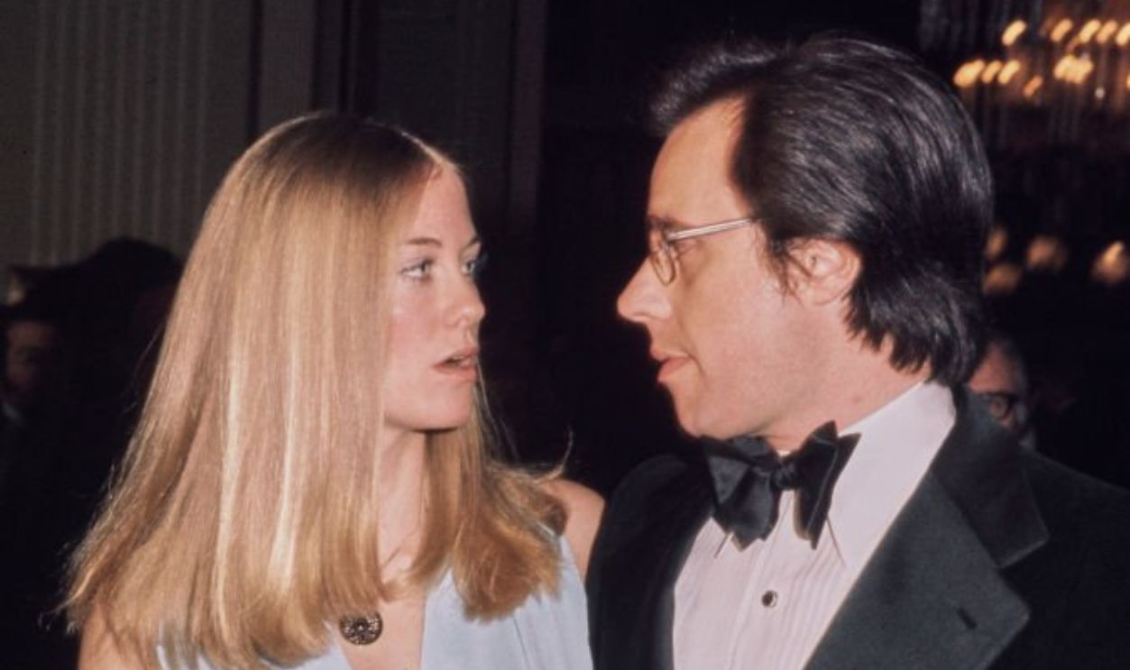 American actress and model Cybill Shepherd, wearing a pale blue dress, and her partner, American film director Peter Bogdanovich, who wears a tuxedo and bow tie, attend the inaugural American Film Institute (AFI) Life Achievement Award Salute, at the Beverly Hilton Hotel in Beverly Hills, California, 31st March 1973. The event honoured American film director John Ford.