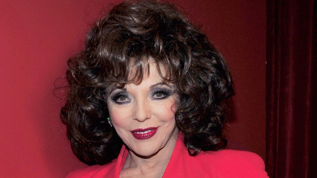 Joan Collins smiling at camera - 2010