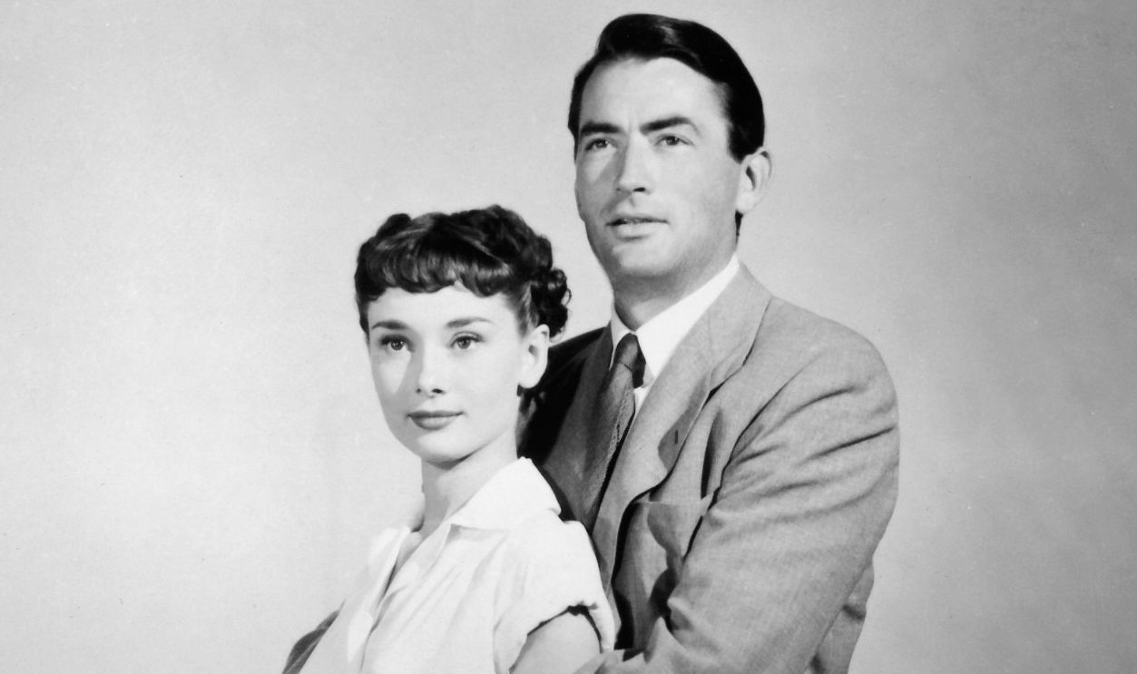 Actors Gregory Peck as Joe Bradley and Audrey Hepburn as Princess Ann in a publicity still for the film 'Roman Holiday', 1953.