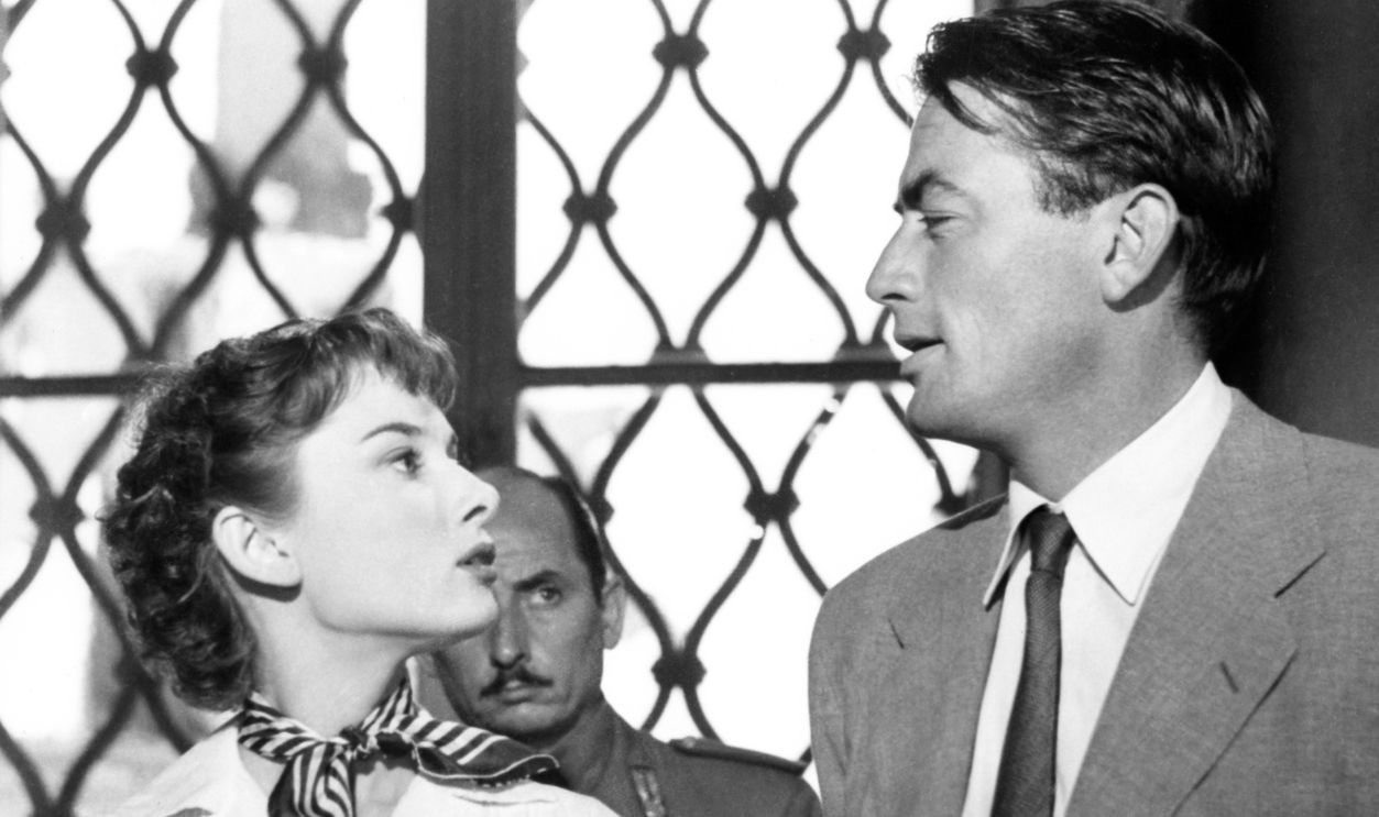 Actors Gregory Peck as Joe Bradley and Audrey Hepburn as Princess Ann in the film 'Roman Holiday', 1953