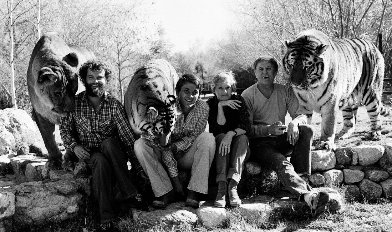Noel Marshall and Tippi Hedren and his sons John and Jerry with their animals on their San Fernando Valley compound. 25th January 1982