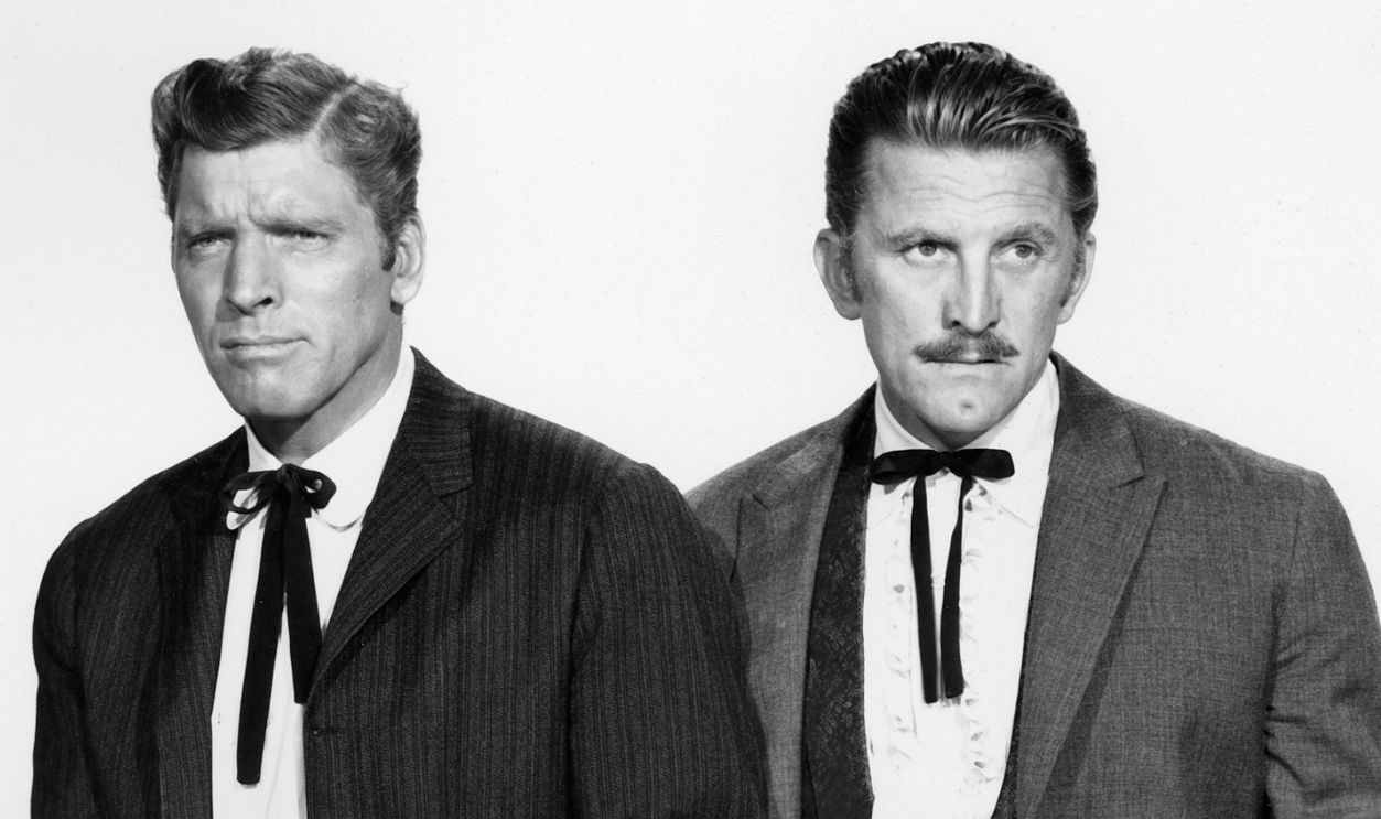 Actors Burt Lancaster (1913 - 1994) and Kirk Douglas (right) in a publicity portrait issued for the film, 'Gunfight at the OK Corral', USA, 1957. The Western, directed by John Sturges, starred Lancaster as Marshal Wyatt Earp and Douglas as Doc Holliday.