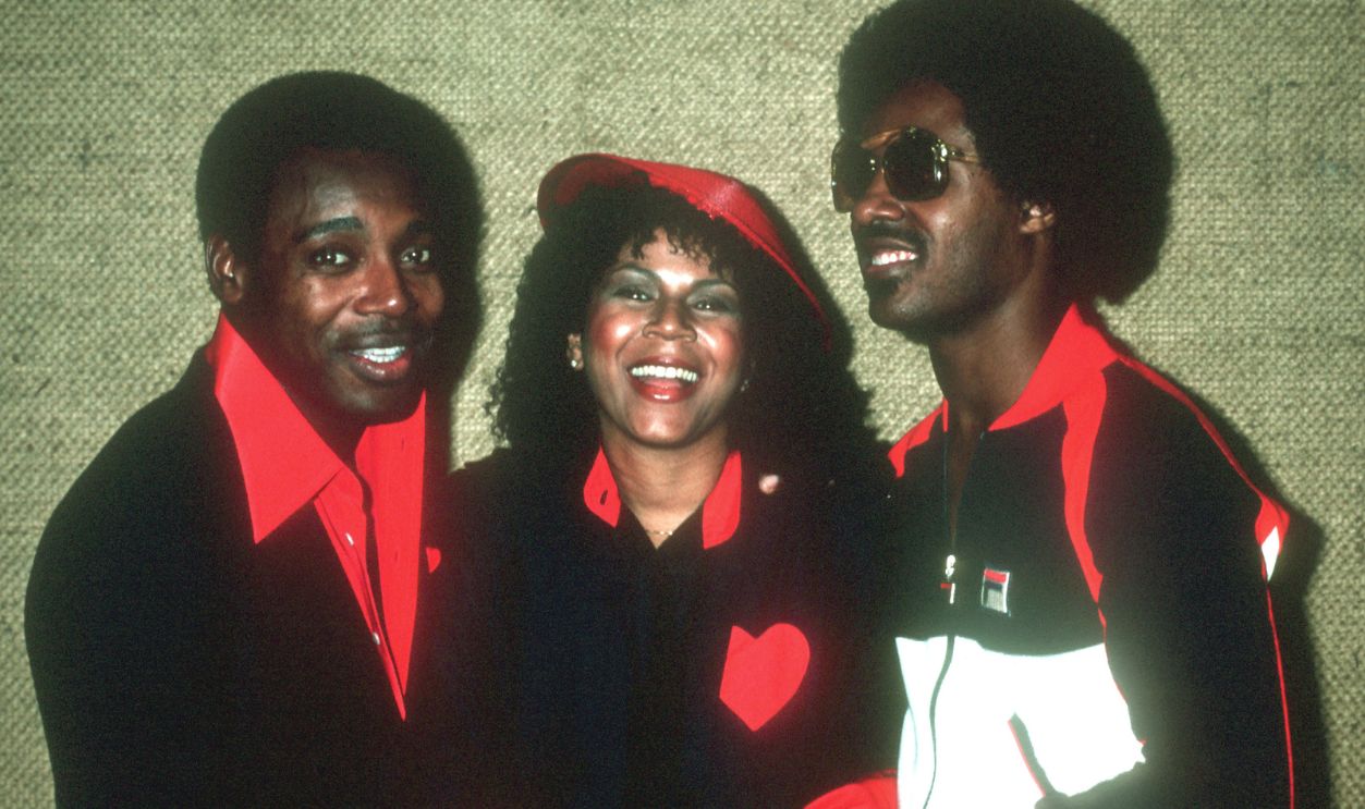 L-R: George Benson, Minnie Riperton And Stevie Wonder pose backstage at an event circa 1978.