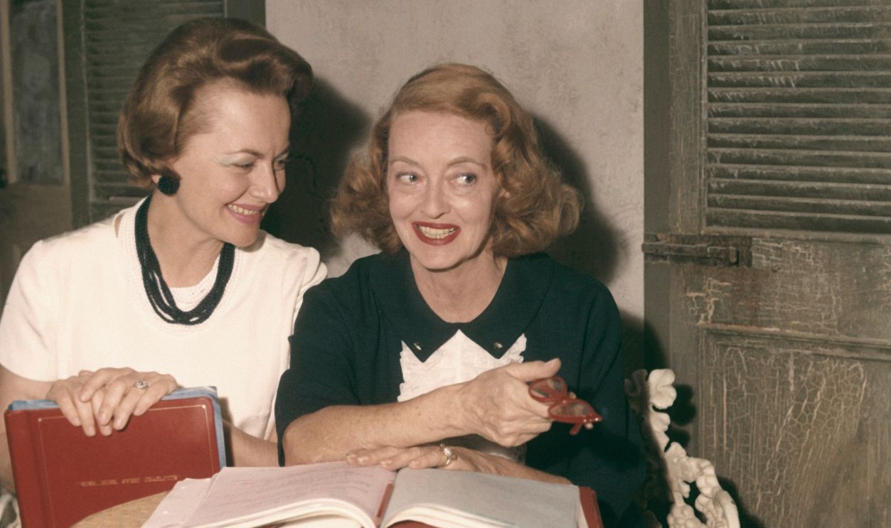 Bette Davis and Olivia De Havilland on set reading script for the classic movie Hush Hush Sweet Charlotte 1964 . 