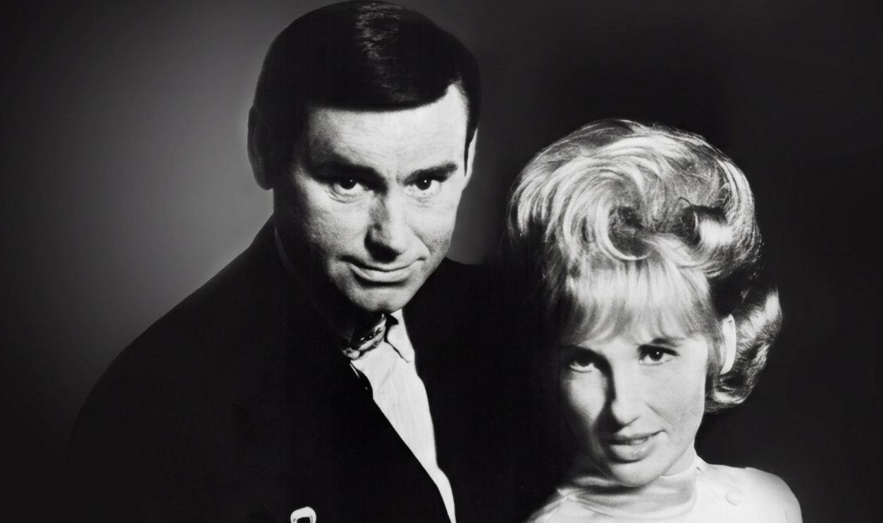 Promotional image of George Jones and Tammy Wynette.
