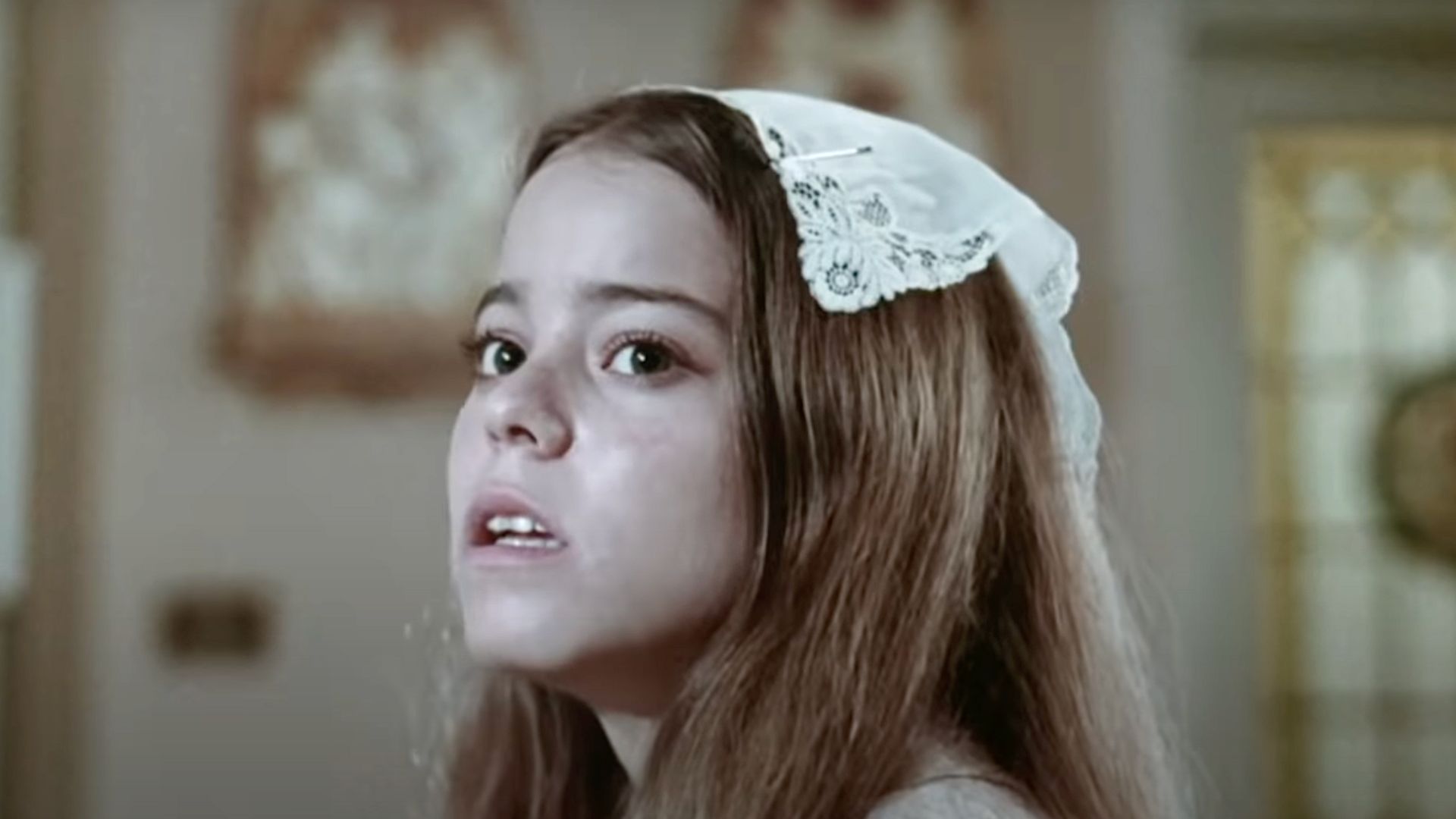 Screen capture from 1976 film Alice, Sweet Alice, from trailer under title Holy Terror.