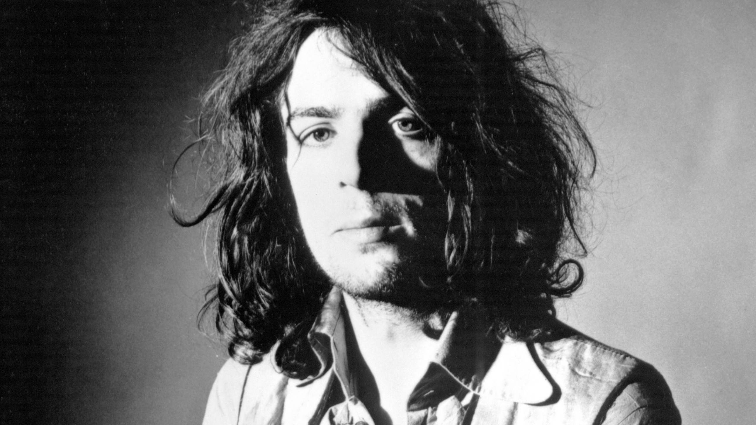 Grayscale Portrait Photo of English singer, guitarist and songwriter Syd Barrett