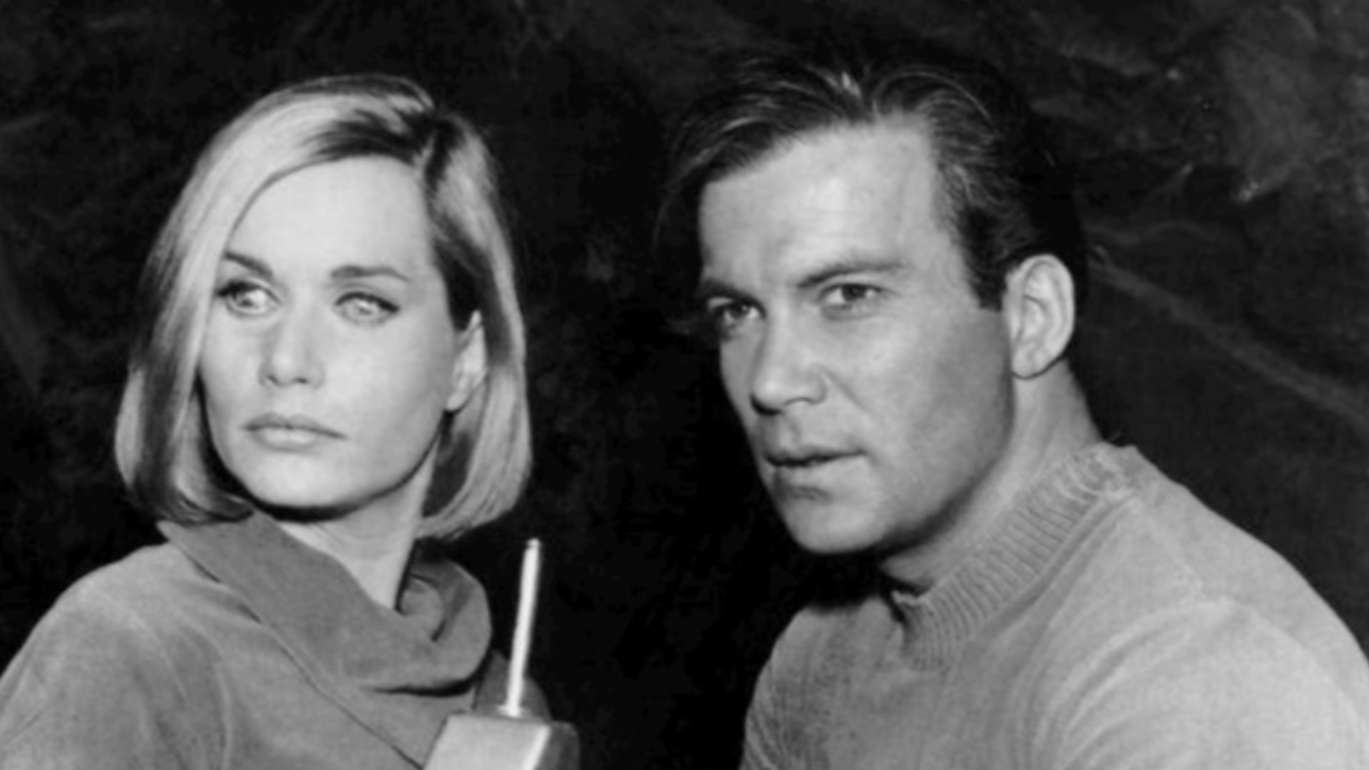 Photo of William Shatner as Captain Kirk and guest star Sally Kellerman as Elizabeth Dehner from the television program Star Trek: The Original Series.  The episode is Where No Man Has Gone Before. This type 3 2260s style phaser appears only in this episo