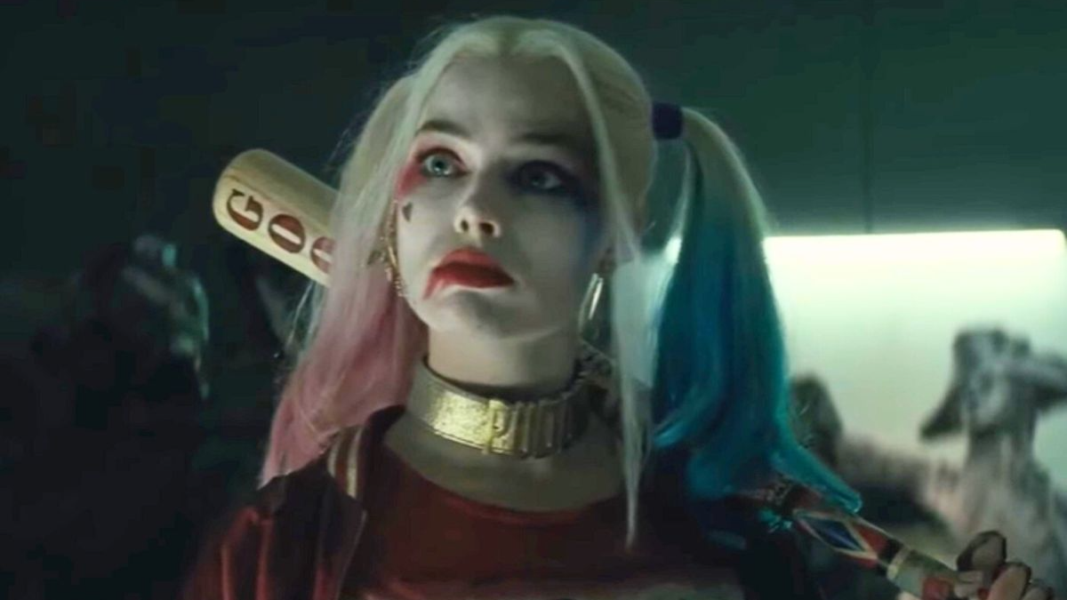 Screenshot: Harley Quinn (Margot Robbie) is holding a bat and looking at side - from Suicide Squad (2016)