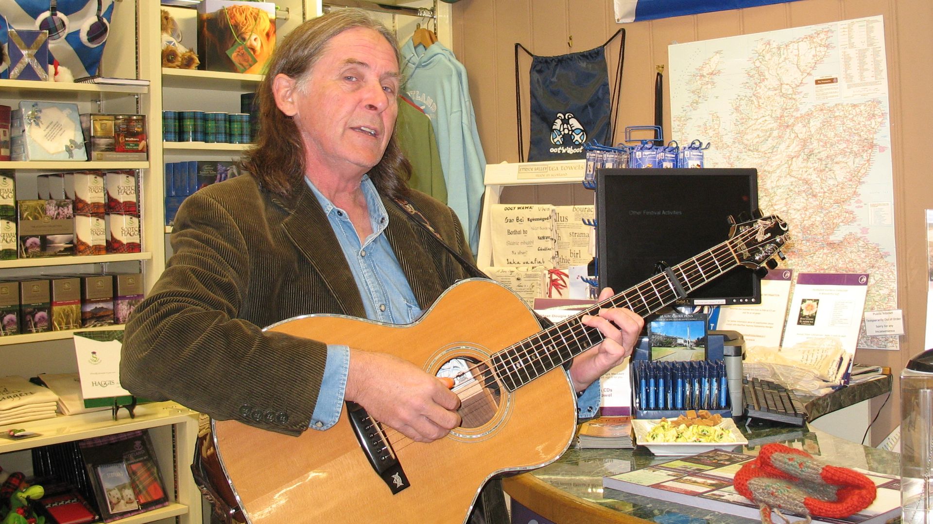 Dougie MacLean singing Caledonia in the Blairgowrie Tourist Information Centre, September 2011
By Diane Snider, My Own Work