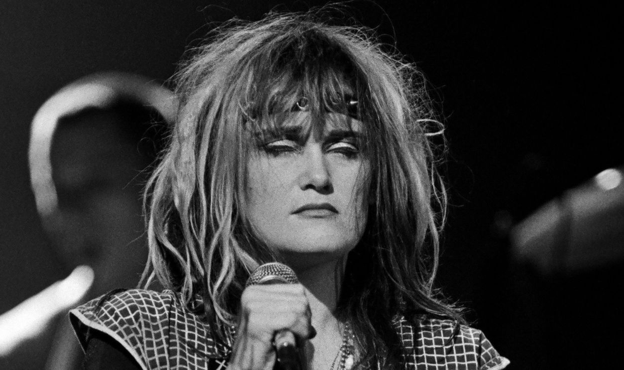 RESEDA, CA - 1982: Exene Cervenka, lead singer of the quintessential Los Angeles punk rock band "X" performs at a 1982 Reseda, California concert. Though the band never had a "Top 40" mainstream hit, it did develop a rabid cult following, influencing numerous other bands of the time. 