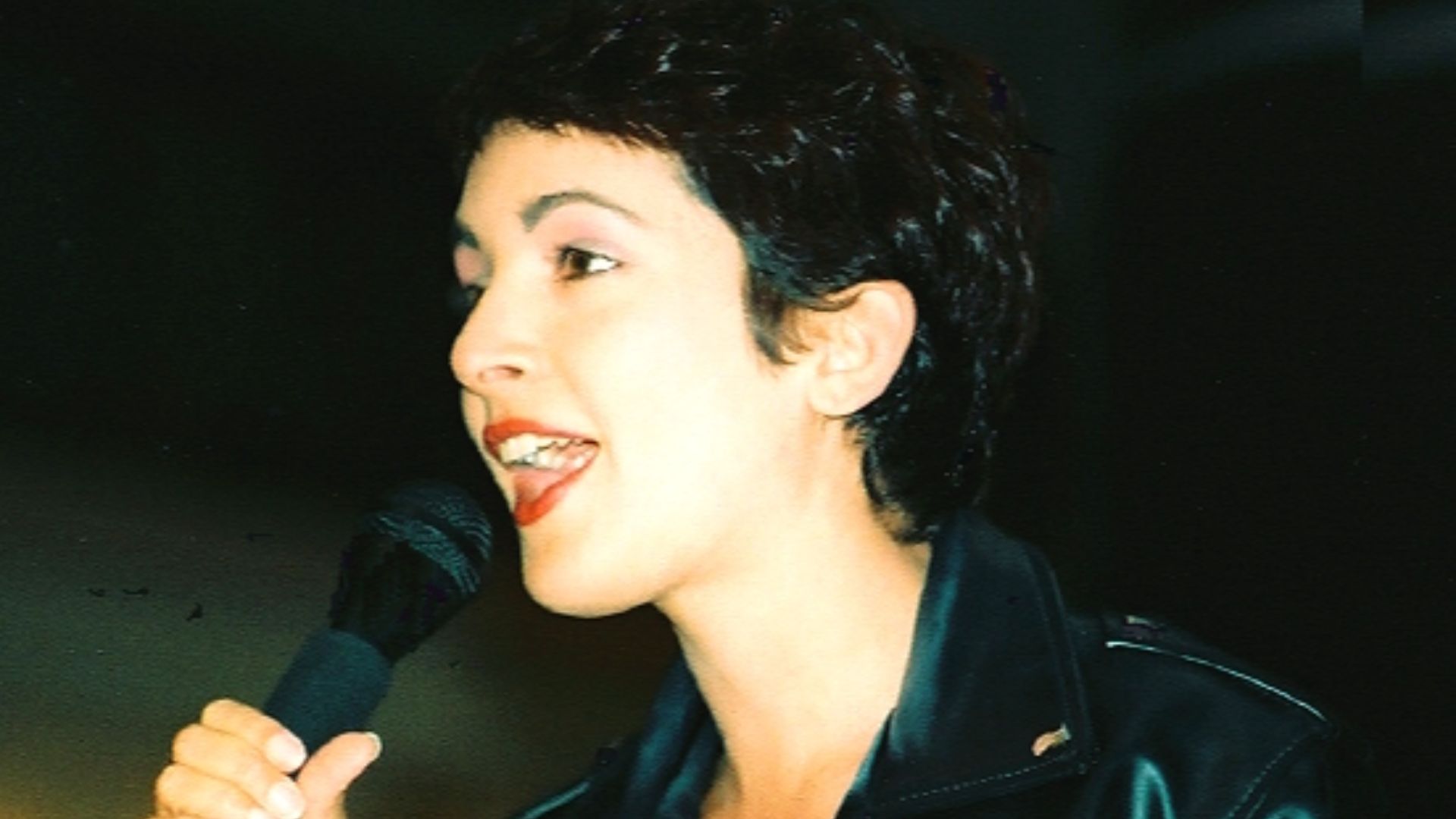 en:Jane Wiedlin taken at the Bourse in en:Philadelphia  Part of a live radio station broadcast that also included performances by en:Brenda K. Starr and en:Jade Starling