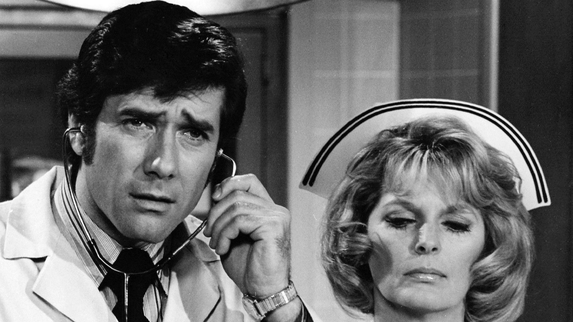 Photo of Robert Fuller as Dr. Kelly Brackett and Julie London as Nurse Dixie McCall from the television series Emergency!.
