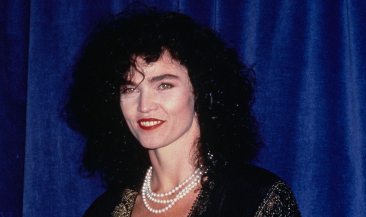 Canadian singer-songwriter Alannah Myles, wearing a black-and-gold fringed jacket over a white outfit, attends the inaugural Billboard Music Awards, at the Barker Hangar of Santa Monica Airport in Santa Monica, California, 26th November 1990.