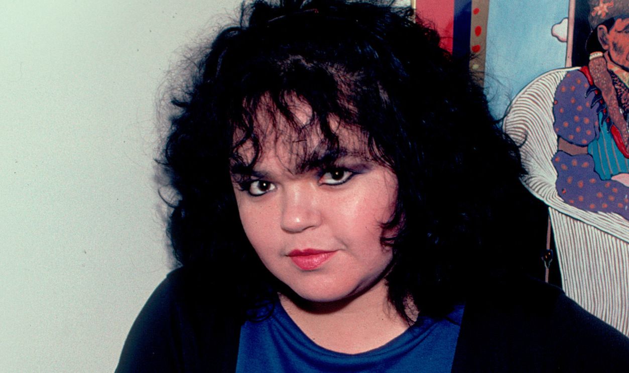 Portrait of singer Debora Iyall of the band Romeo Void at the Park West in Chicago, Illinois, October 22, 1982.