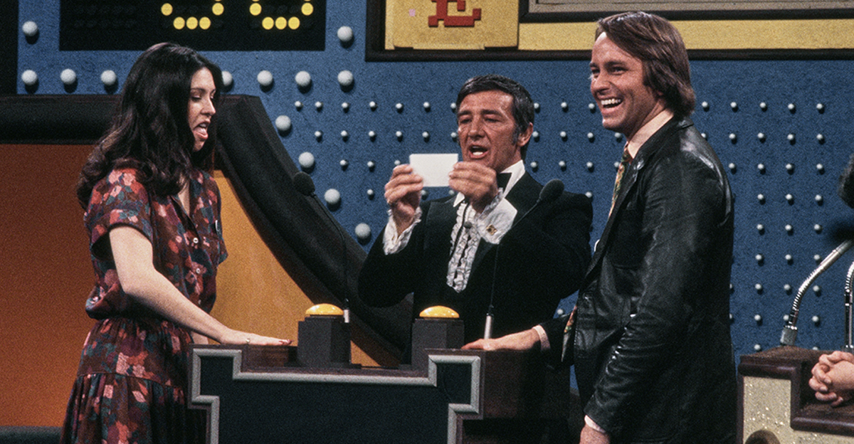 Host Richard Dawson (centre) asking a question for the American actors Diana Canova and John Ritter during the ABC television show 'All-Star Family Feud Special', United States, 1978. The casts of 'The Love Boat', 'Eight is Enough', 'Three's Company', and 'Soap' all featured in the special.
