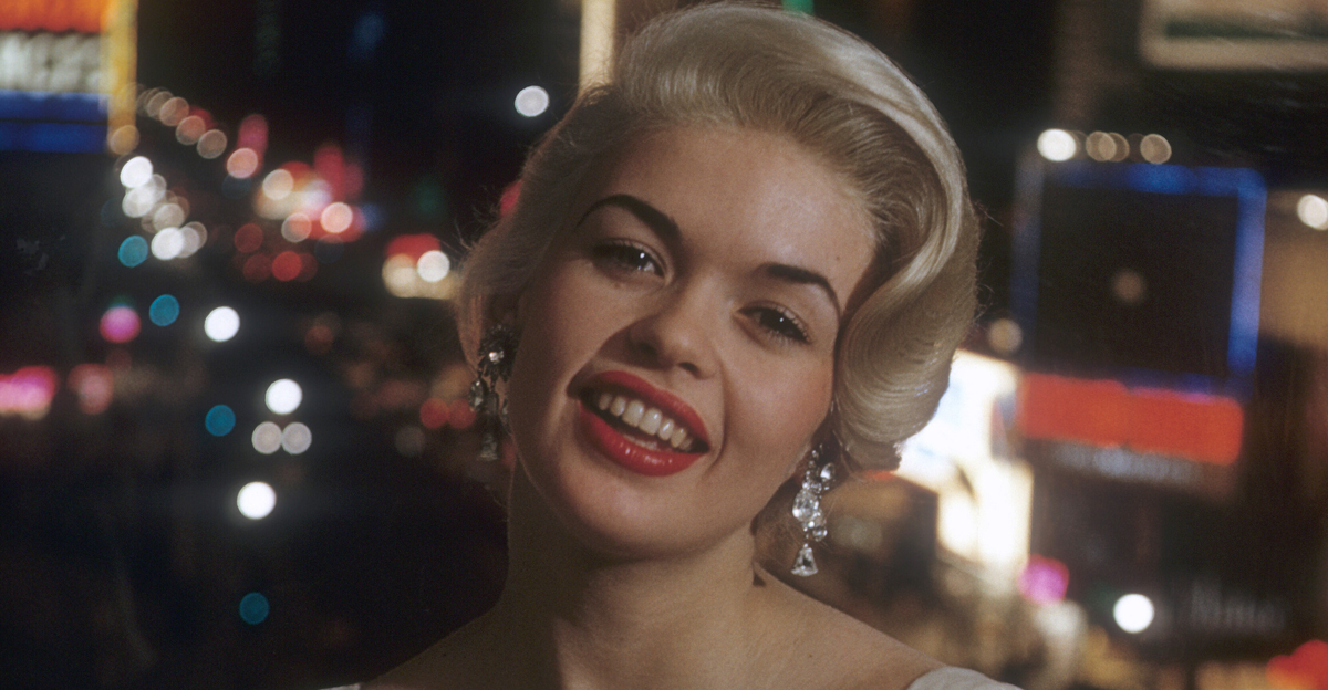 American actress and former Playboy playmate Jayne Mansfield (1933 - 1967) wearing a white evening gown, circa 1960.