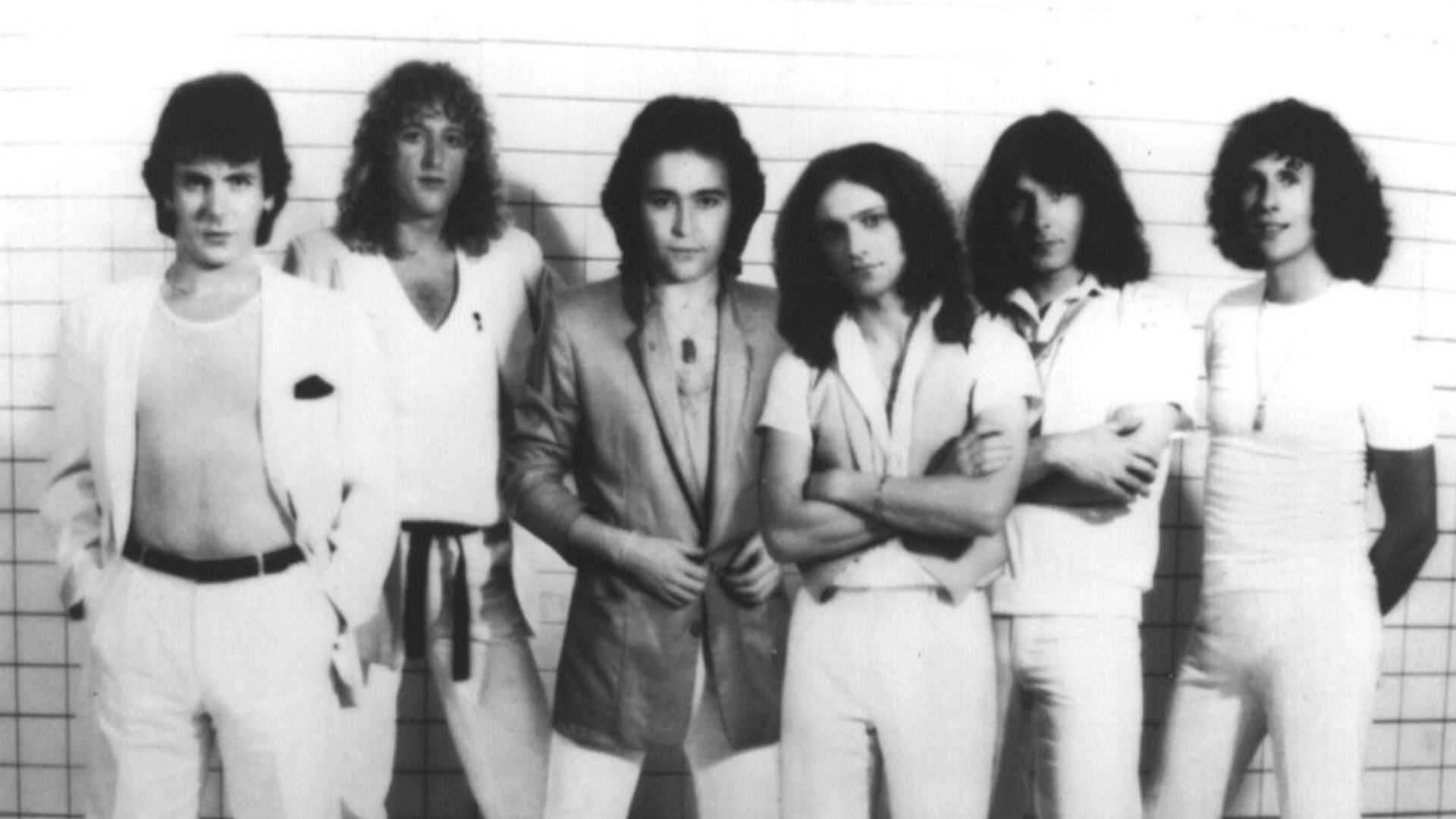 Musical group Foreigner in a 1979 publicity photo for their album Head Games. Pictured left to right; Ian MacDonald, Rick Wills, Mick Jones, Lou Gramm, Al Greenwood, and Dennis Elliot.