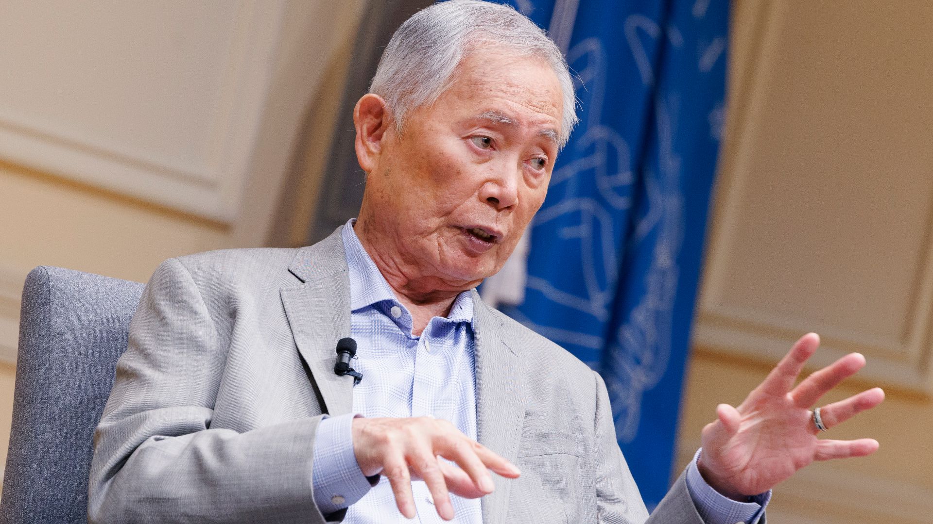 Author and actor George Takei speaks to local school groups at the Library of Congress, May 10, 2024. Photo by Shawn Miller/Library of Congress. 
Note: Privacy and publicity rights for individuals depicted may apply.