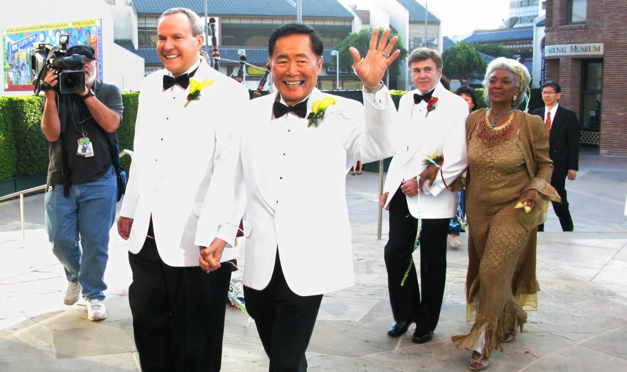 Actor George Takei (2nd L) (the "Sulu" character on "Star Trek") and partner Brad Altman (L) after they were married at the Japanese American National Museum on September 14, 2008 in Los Angeles. Fellow "Star Trek" actors Walter Koenig (2nd R) and Nichelle Nichols (R) who participated in the ceremony follow. 