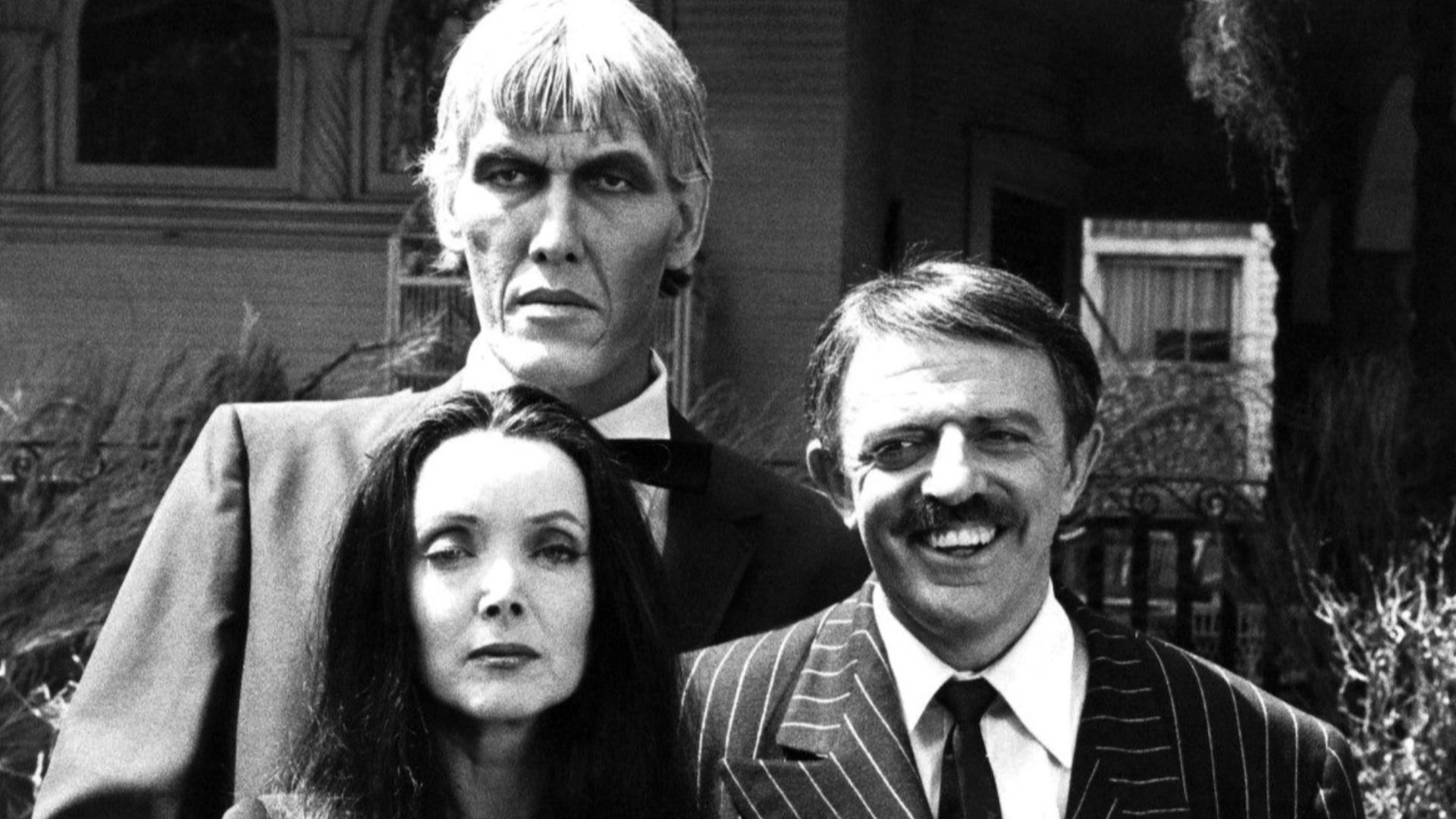 Photo of the main cast of the television program The Addams Family.  From left-Ted Cassidy (Lurch), Carolyn Jones (Morticia) and John Astin (Gomez).  In 1977, NBC reunited the original cast of the series for a Halloween Big Event Special.  This photo is f
