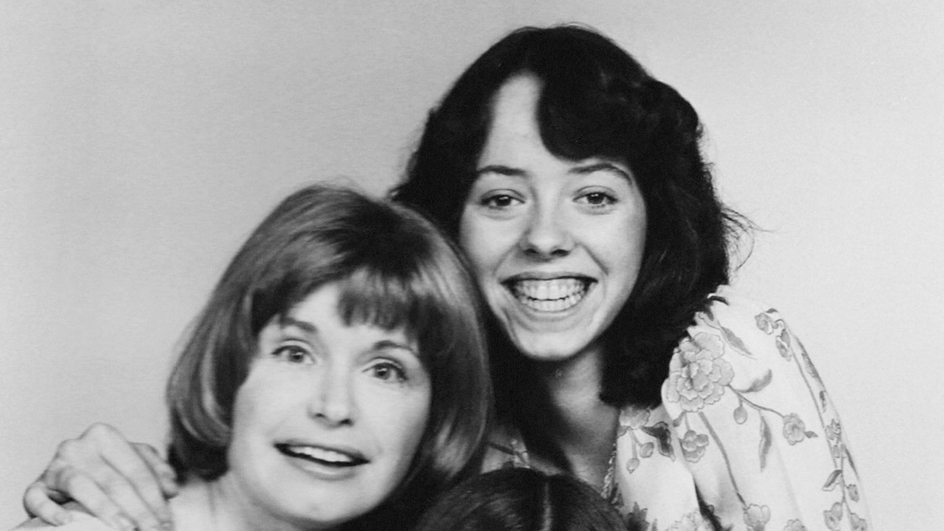 Photo of the female cast members of the television series One Day at a Time.  Clockwise from left: Bonnie Franklin (Ann Romano), Mackenzie Phillips (Julie Cooper), and Valerie Bertinelli (Barbara Cooper).