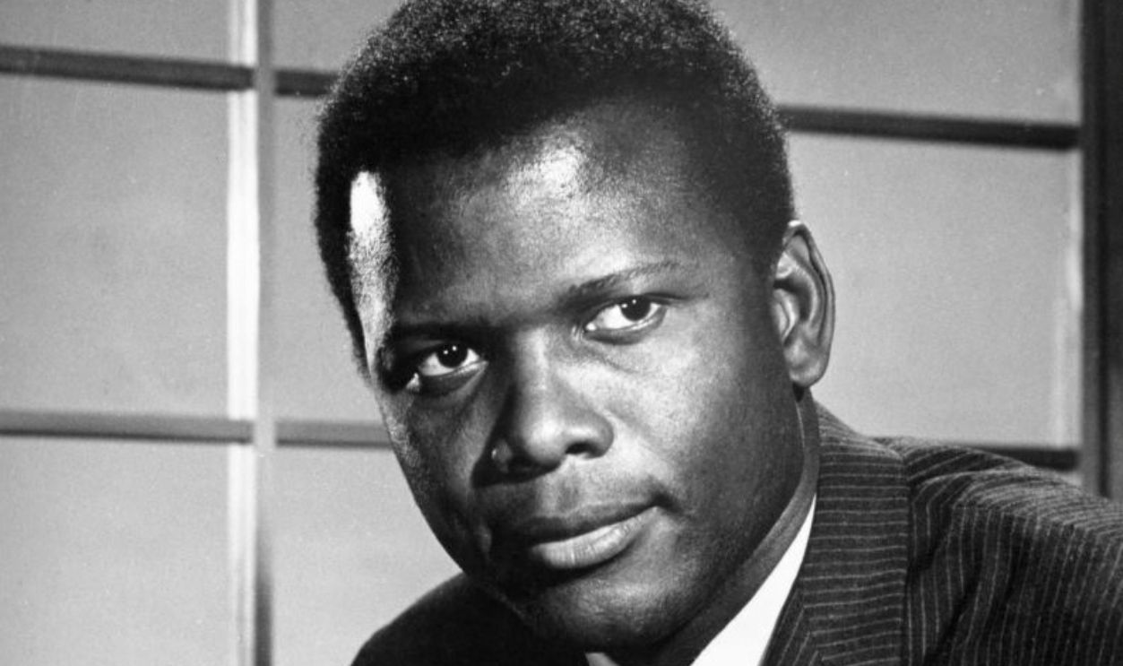 Grayscale Portrait Photo of American actor Sidney Poitier, circa 1960s
