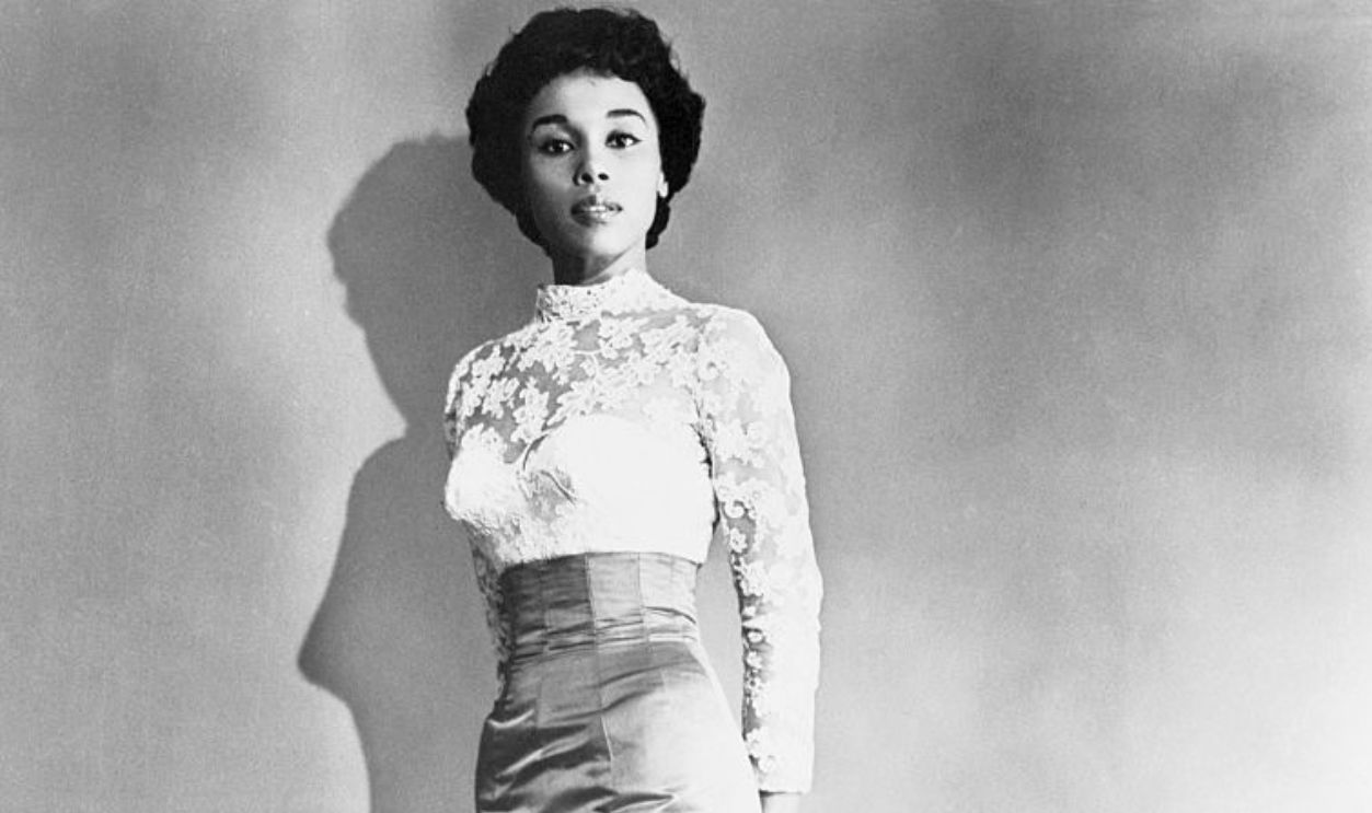 Portrait of the actress Diahann Carroll wearing white clothing