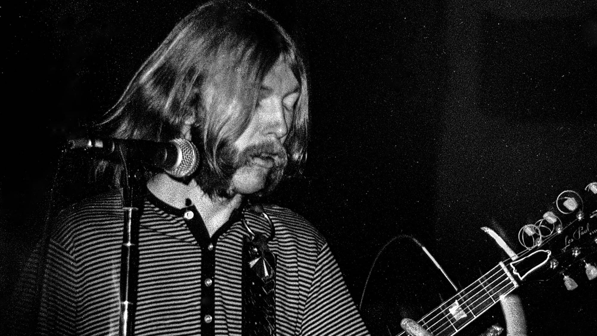 Duane Allman performs on stage