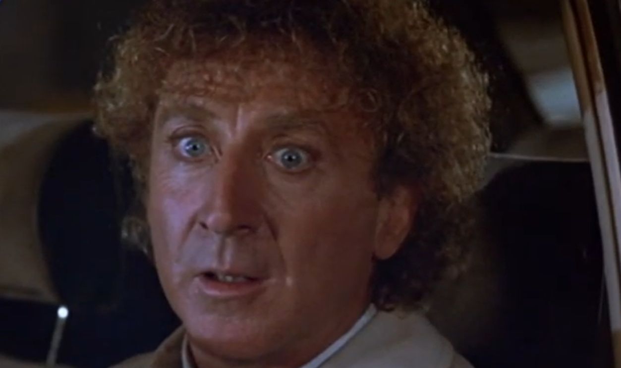 Screenshot from The Woman in Red (1984)