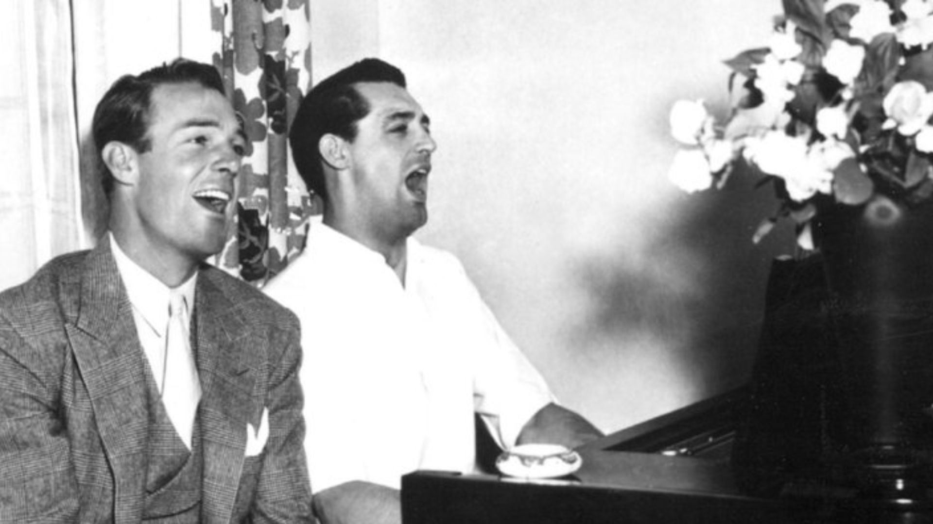 Photo of Randolph Scott and Cary Grant from the August 1933 issue of New Movie Magazine. Scott and Grant shared a house in Hollywood during the early years of their film work.
Caption provided with the photo.