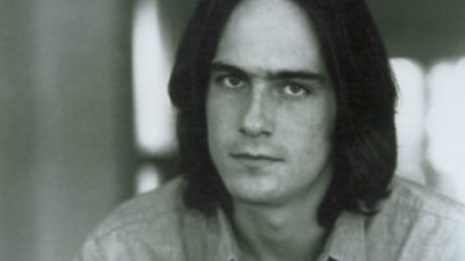 Promotional photo of James Taylor.