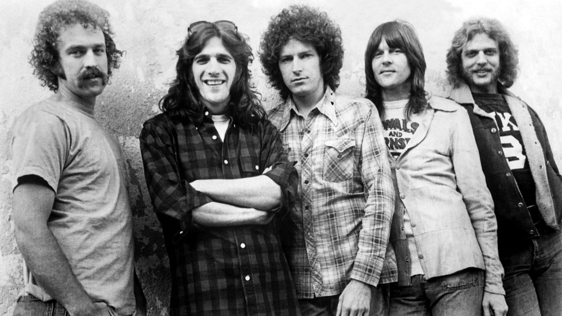 Press photo of the band Eagles by Asylum. Although no date is given, it dates from 1974 to 1975, as those were the only two years the lineup depicted was active. No copyright markings on the photo.