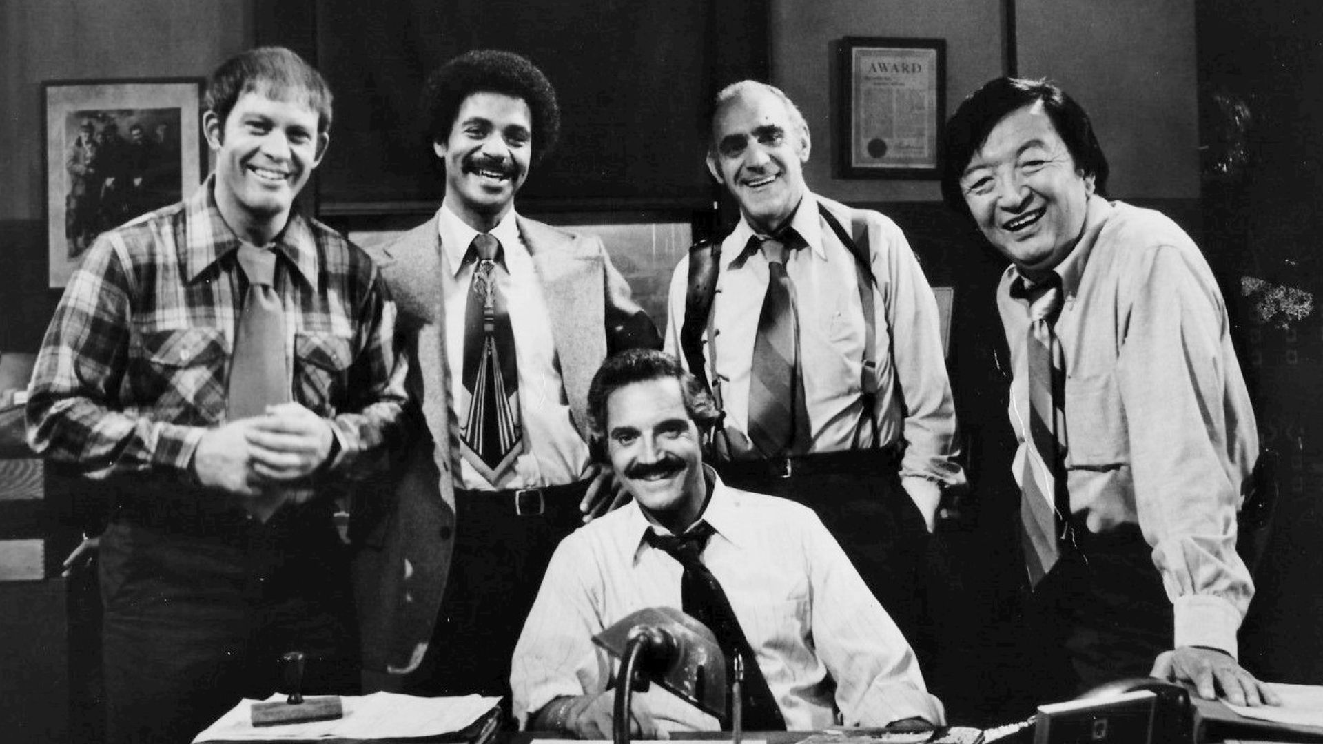 1977 cast photo from the television series Barney Miller.  From left: Max Gail (