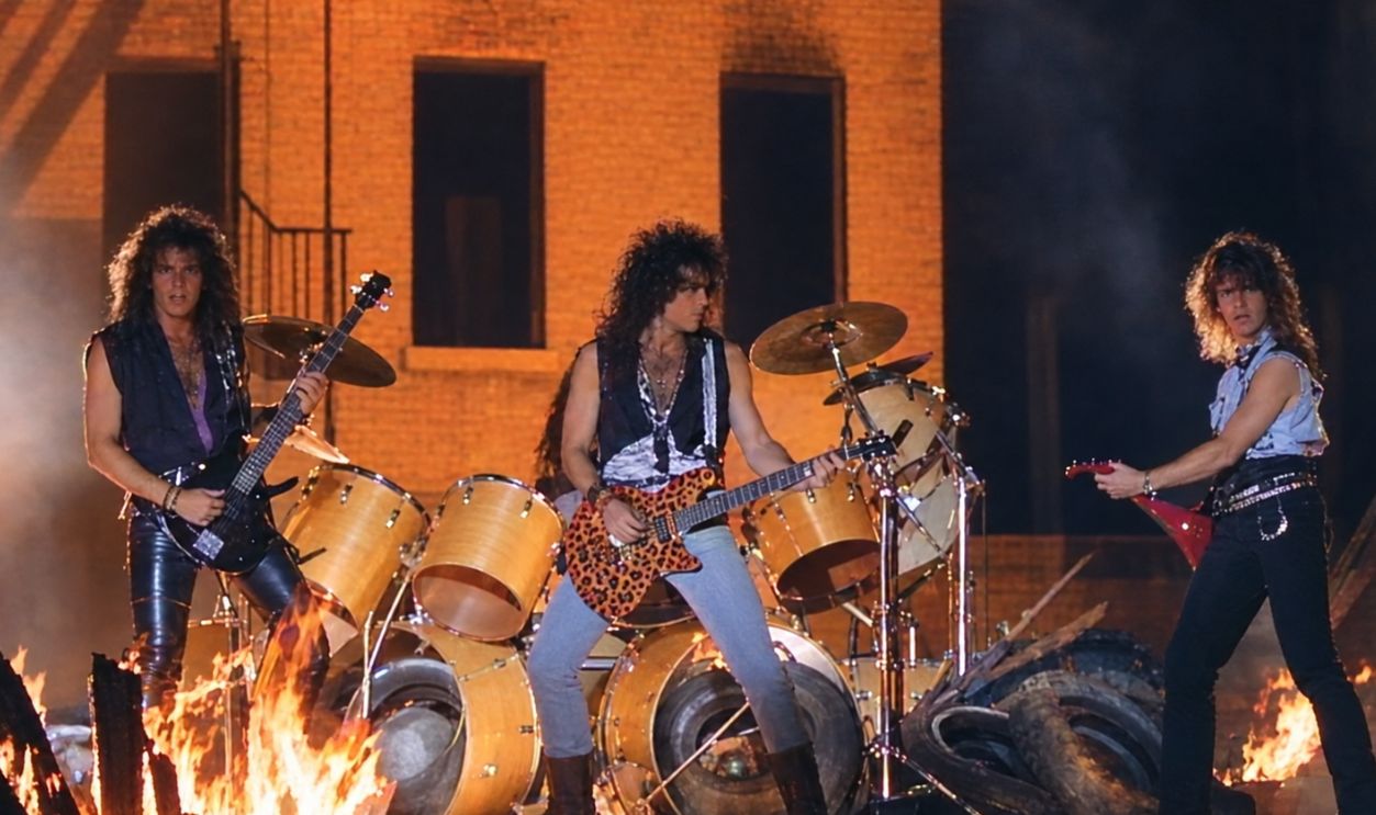 Screenshot from Lick It Up, Mercury Records (1983)